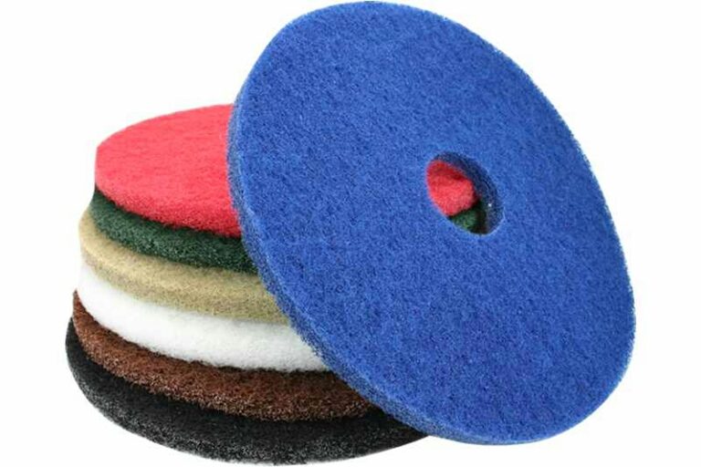 white, red green blue and black buffing pads